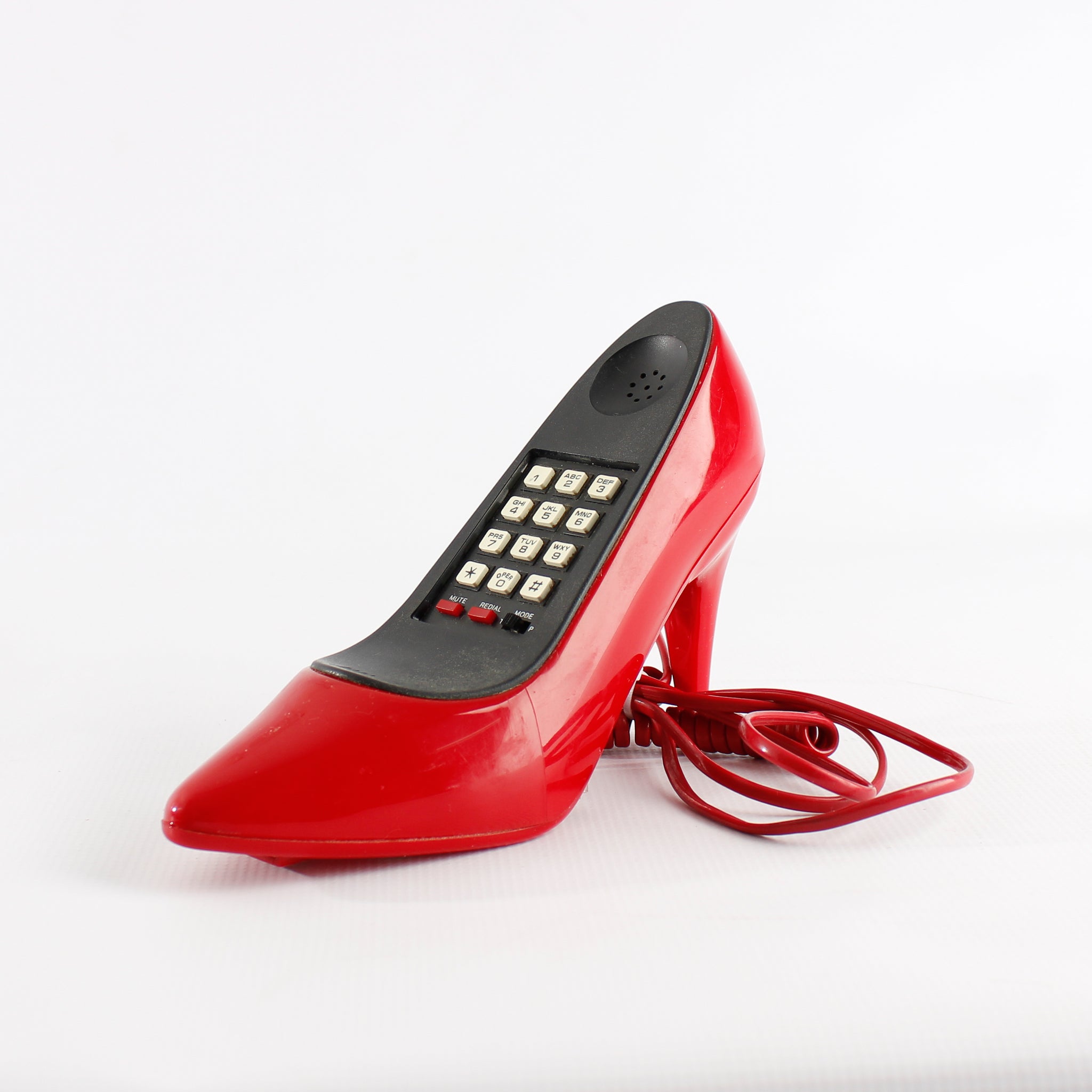 Téléphone talon haut rouge 1987